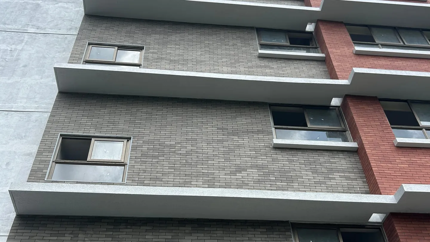 Institutional building with mixed cladding, the kind of finished project that starts with finding the right supplier rather than the first listing.